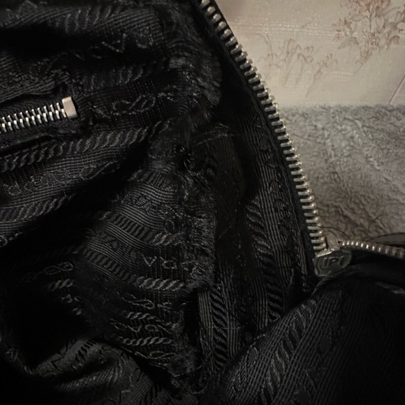 Prada black nylon tote. Great on outside. Needs repair on insider. See all pics - Picture 10 of 11